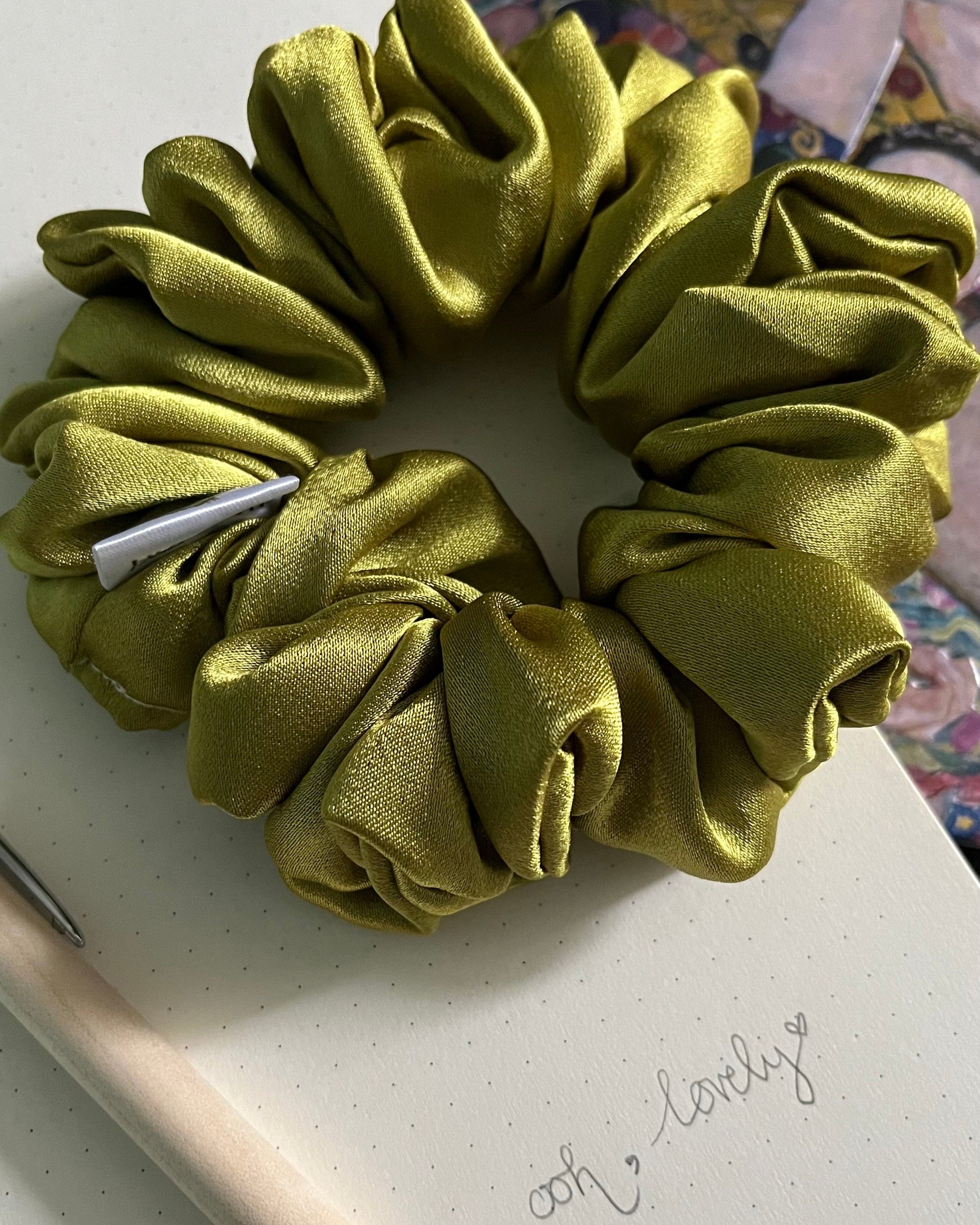 Unique quirky chartreuse Grinch green luxury satin mini hair accessory handmade in Nottingham