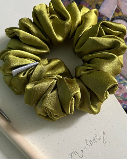 Unique quirky chartreuse Grinch green luxury satin mini hair accessory handmade in Nottingham