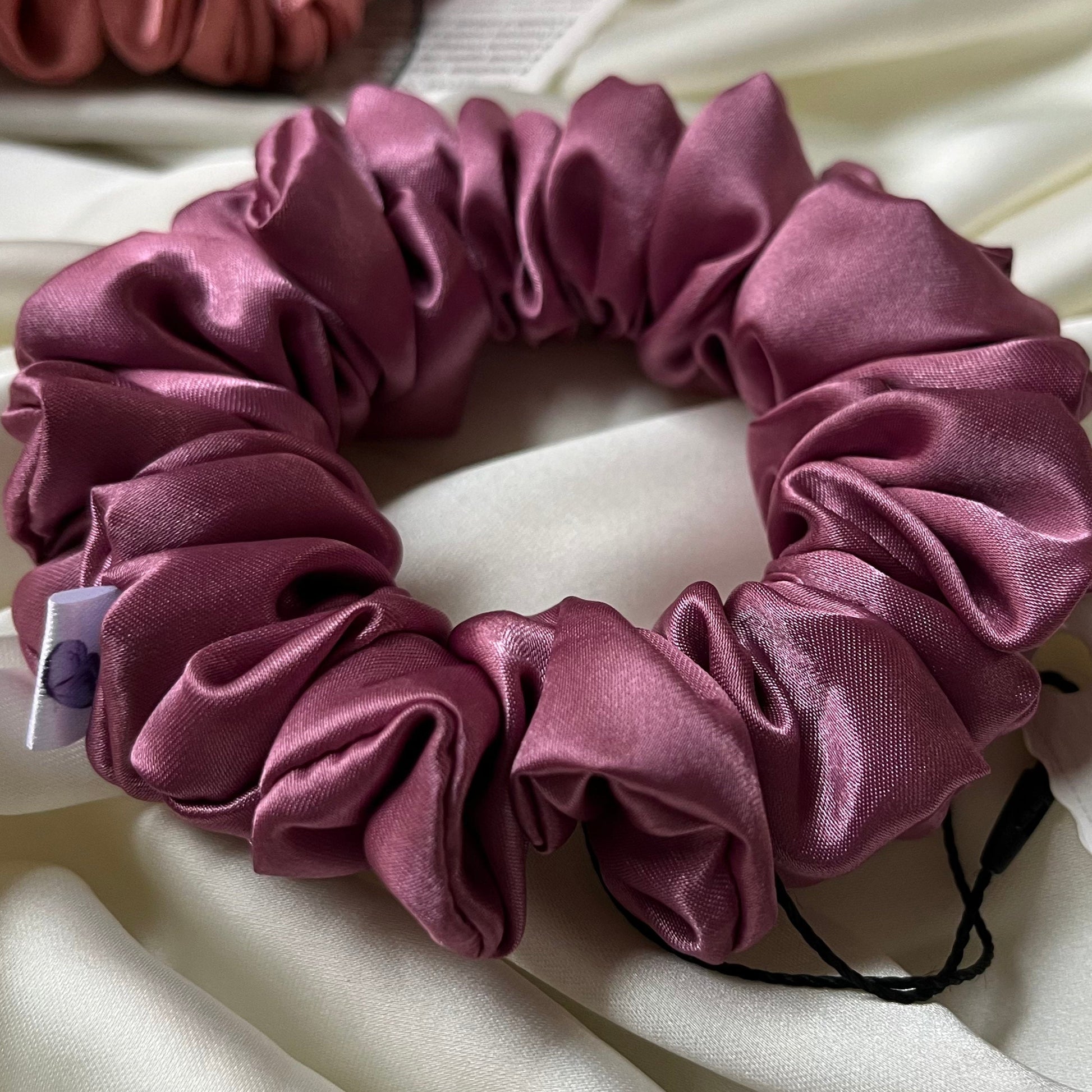 luxe duchess satin in pink mauve dusty rose is soft, silky and ecudes elegance in all hair types. Sustainably handmade in notts. Inspired by regency bridgerton coquette aesthetic 