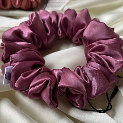 luxe duchess satin in pink mauve dusty rose is soft, silky and ecudes elegance in all hair types. Sustainably handmade in notts. Inspired by regency bridgerton coquette aesthetic 