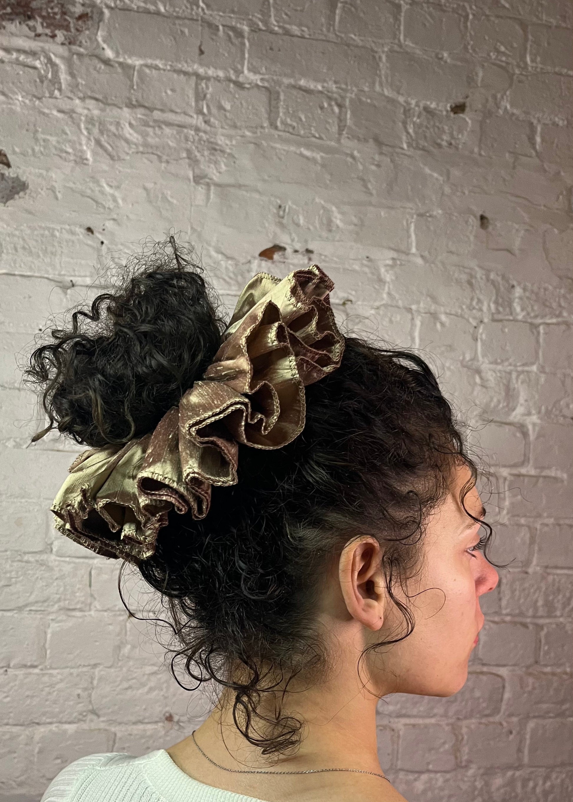 Human and delicate pure silk luxury scrunchie oversized ruffled hair accessory modelled in curly hair messy up do