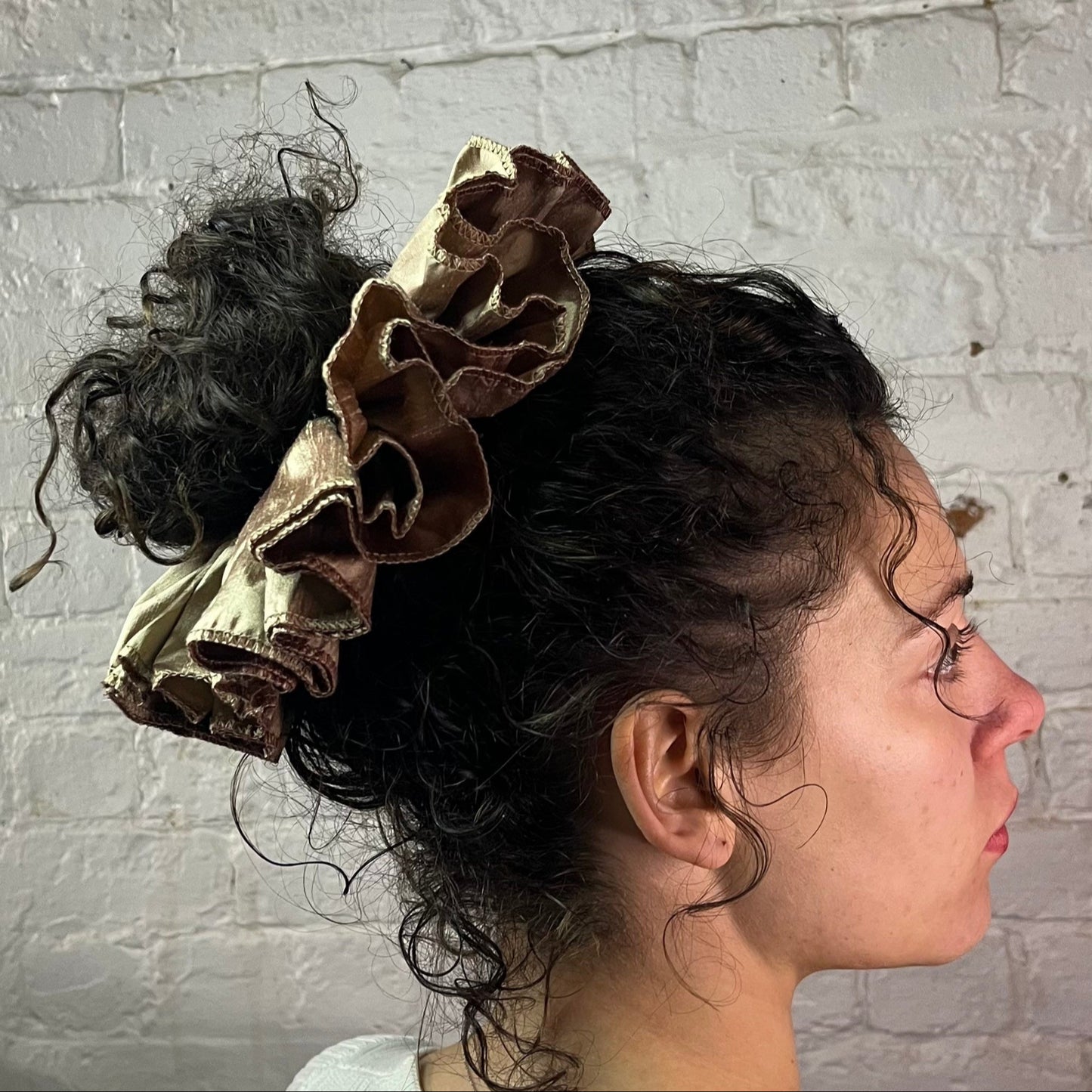 pure silk dupion antique gold luxury scrunchie oversized ruffled made with deadstock remnant fabric. modelled in curly updo. by human and delicate